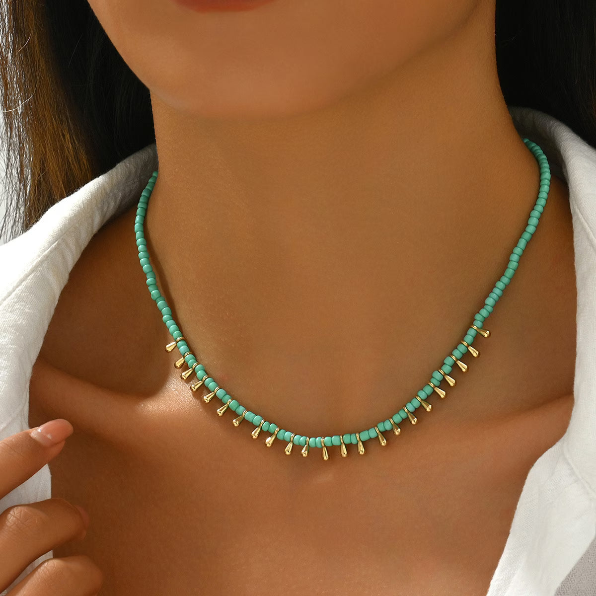 Minimale Turquoise en Gouden Ketting