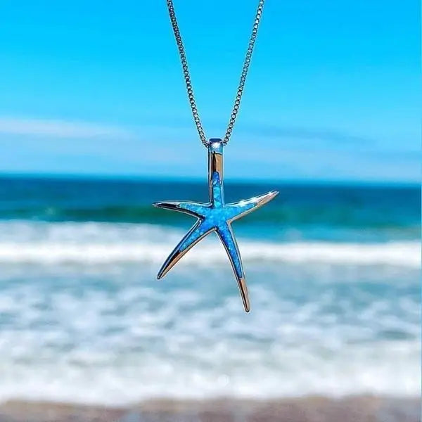 Halsband met zeester-hanger in zilver met blauwe opaal