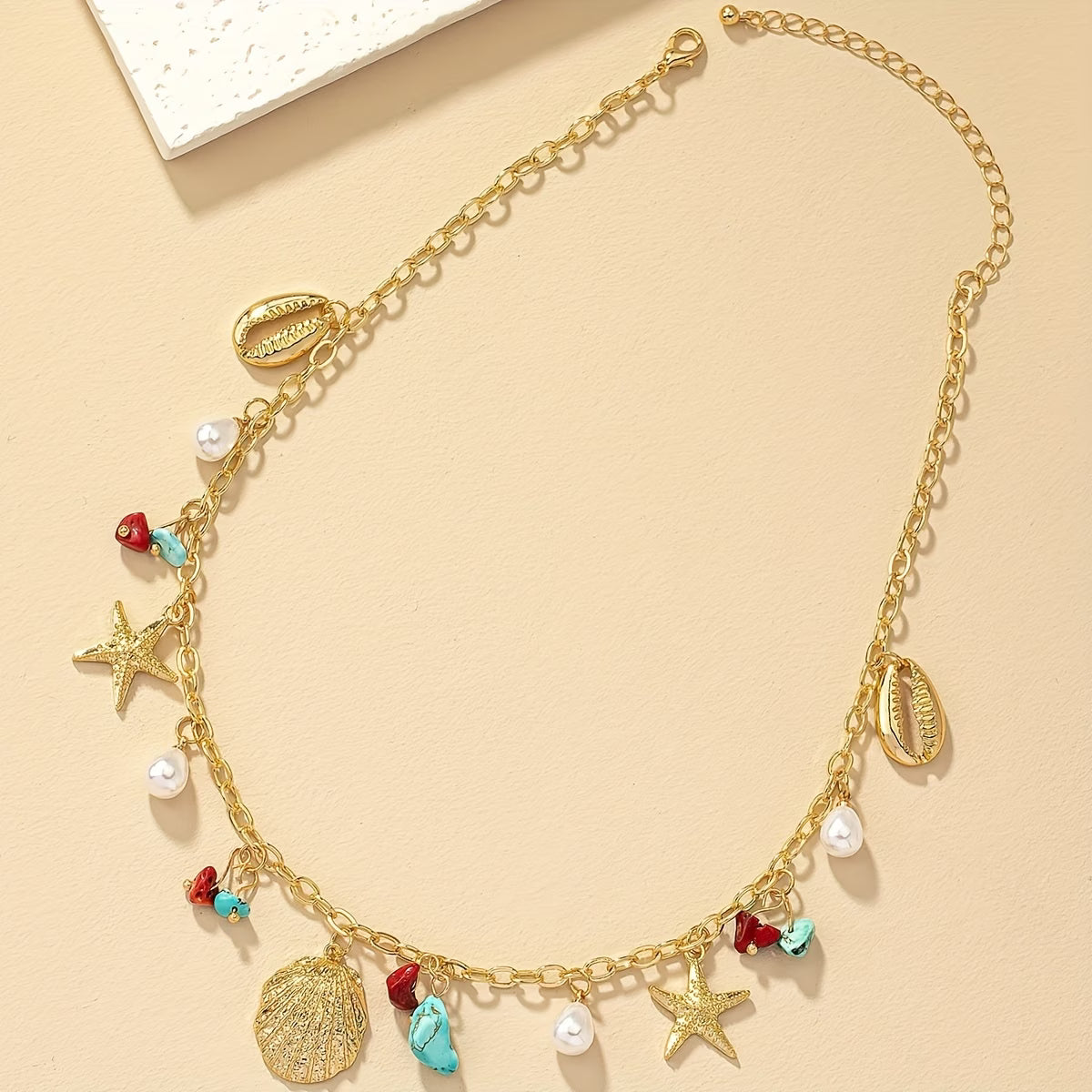 Kustparel en Turquoise Schelpenarmband