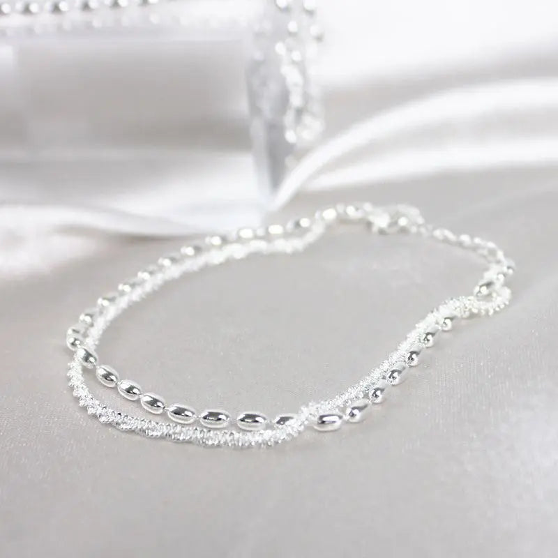 Set van elegante zilveren armbanden met zirconiumstenen