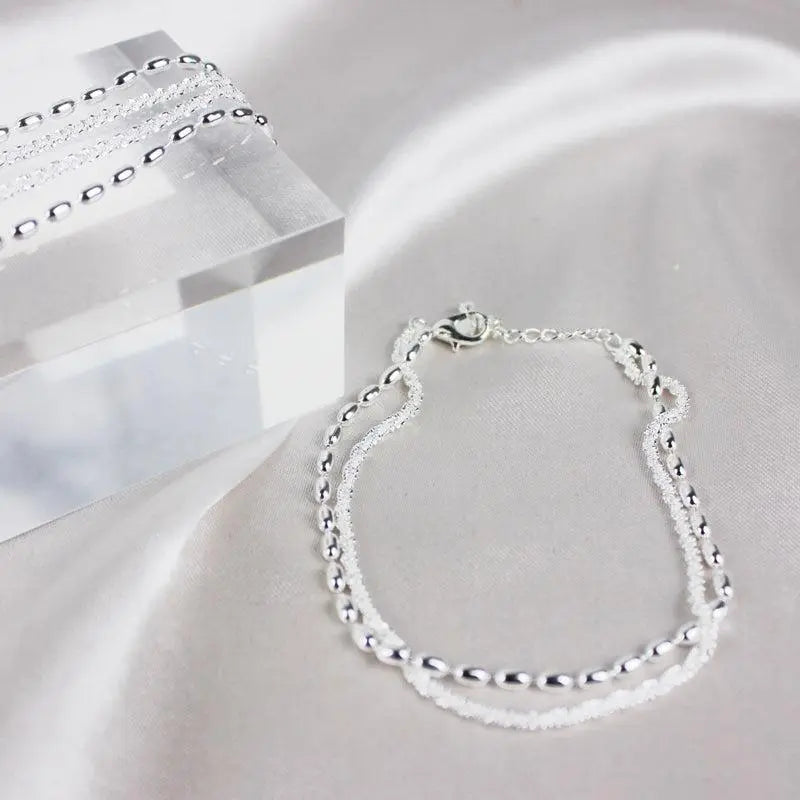 Set van elegante zilveren armbanden met zirconiumstenen
