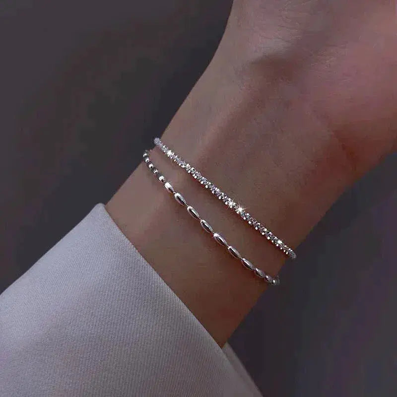 Set van elegante zilveren armbanden met zirconiumstenen