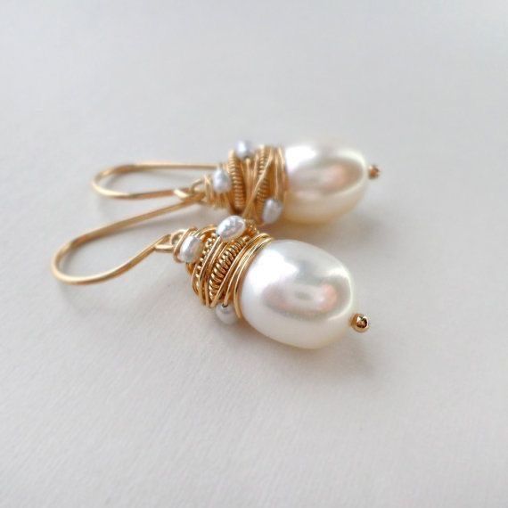 Vintage oorbellen met parels en gouden draden
